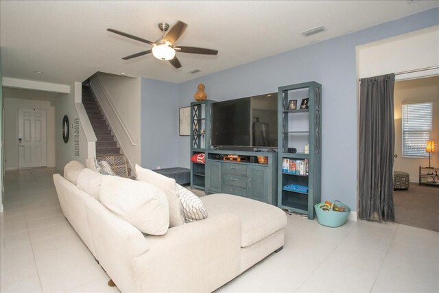 living room featuring ceiling fan