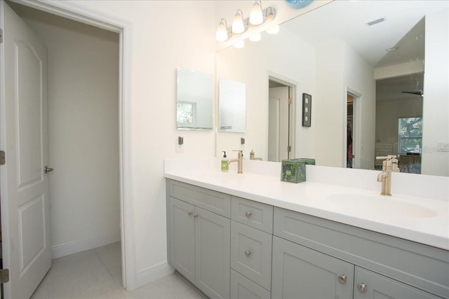 bathroom featuring vanity and tile patterned flooring