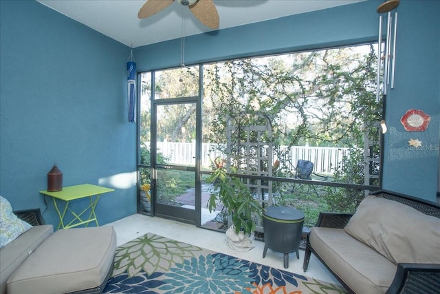 sunroom / solarium with ceiling fan