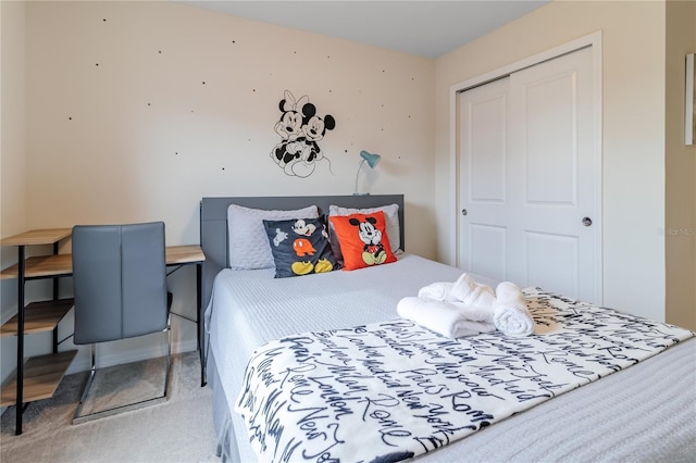 carpeted bedroom with a closet