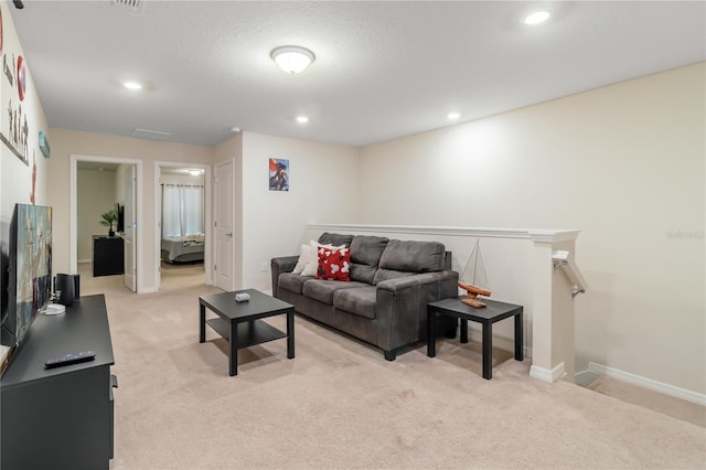 living room with light colored carpet