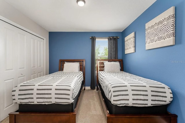 bedroom featuring carpet floors and a closet