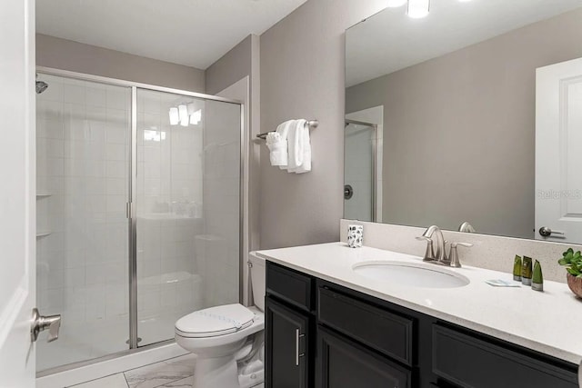 bathroom with toilet, an enclosed shower, and vanity