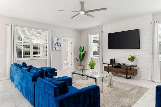 living room featuring ceiling fan