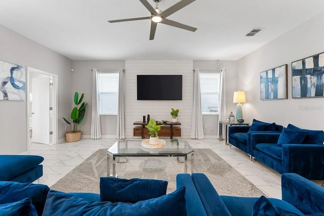 living room featuring ceiling fan