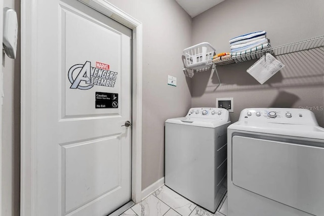 laundry room with independent washer and dryer