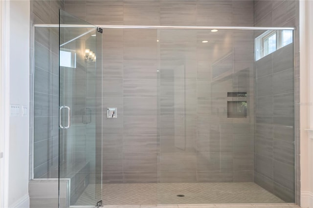 bathroom featuring an enclosed shower