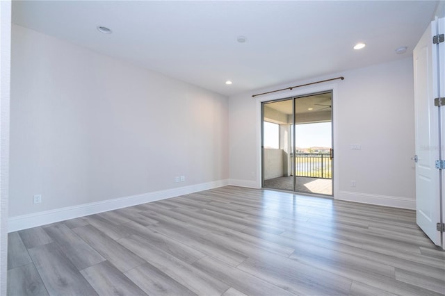 unfurnished room featuring light wood-type flooring