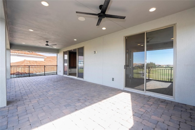 view of patio featuring ceiling fan