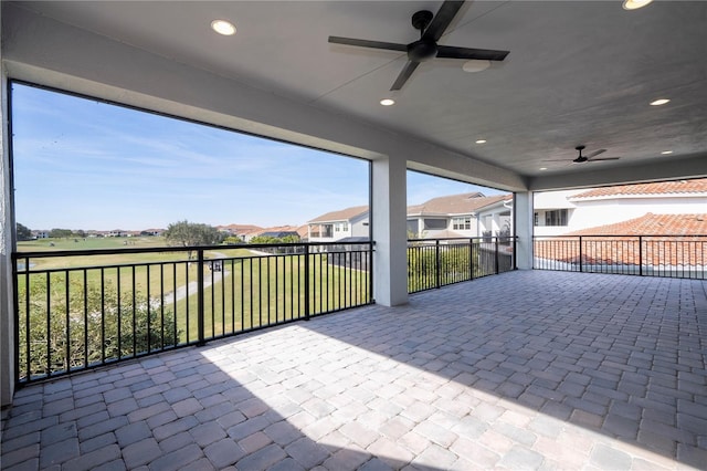 view of patio / terrace featuring ceiling fan