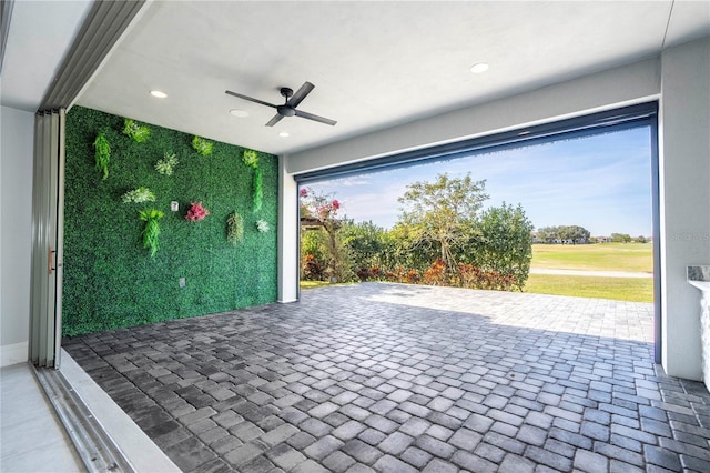 view of patio with ceiling fan