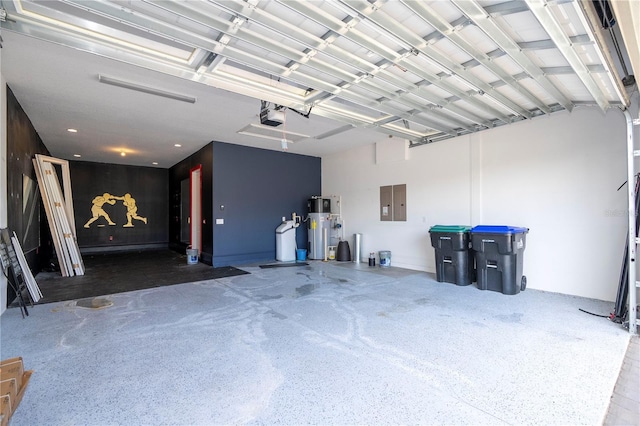 garage featuring electric panel, heat pump water heater, and a garage door opener