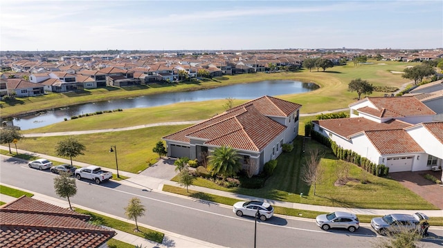 drone / aerial view with a water view