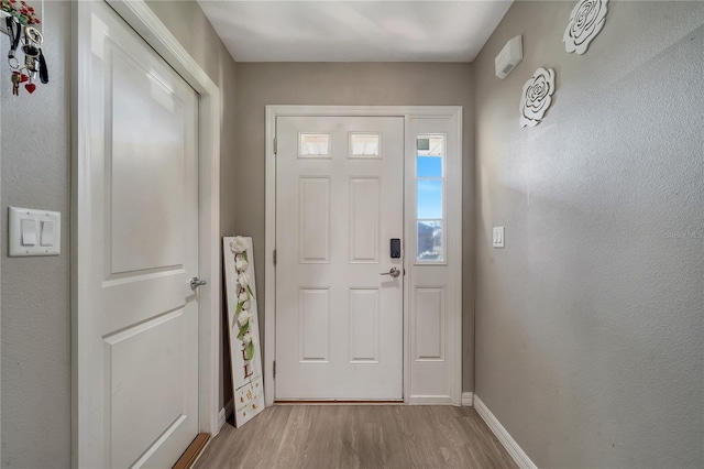 foyer featuring light hardwood / wood-style floors