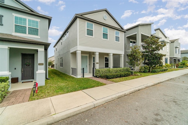 view of front of property with a front lawn