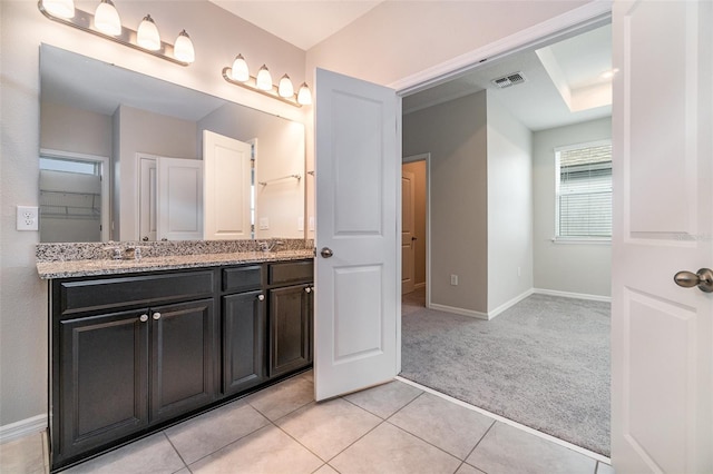 bathroom featuring tile patterned floors and vanity