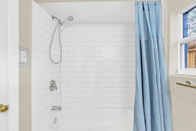 bathroom featuring shower / bath combination with curtain