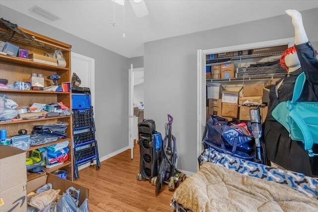 storage room with ceiling fan