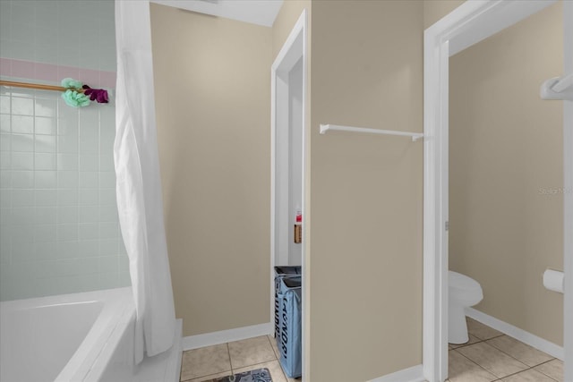 bathroom featuring toilet, shower / bathtub combination with curtain, and tile patterned floors