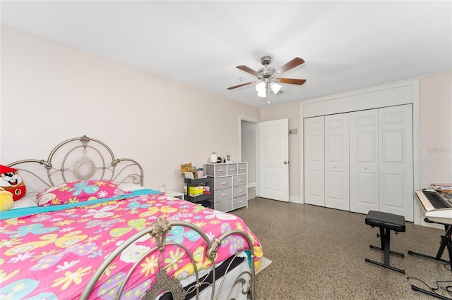 bedroom featuring ceiling fan and a closet