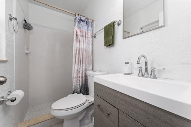 bathroom featuring curtained shower, toilet, and vanity