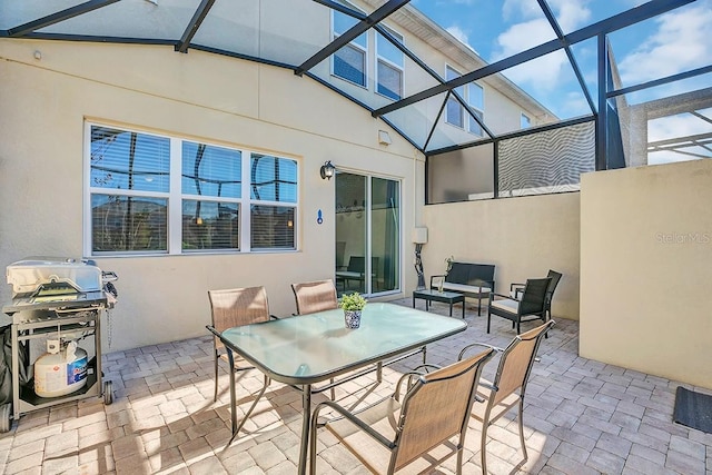 view of patio with an outdoor hangout area, a lanai, and grilling area