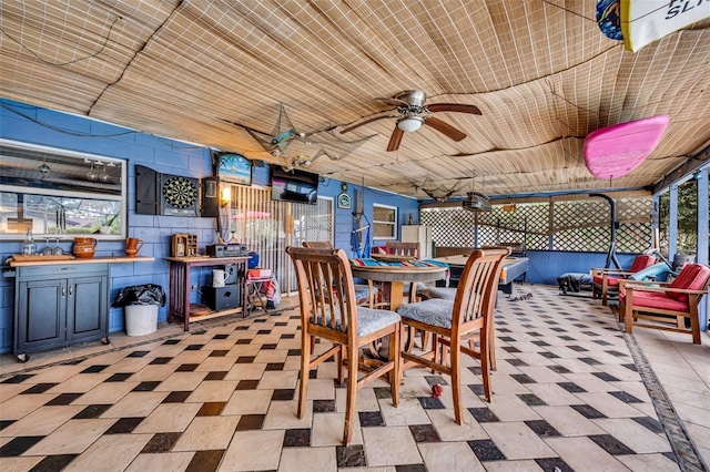 view of patio / terrace featuring ceiling fan and an outdoor kitchen