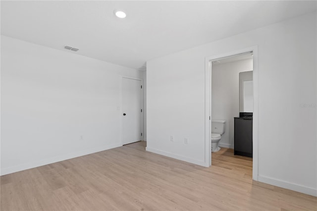 empty room featuring light hardwood / wood-style floors