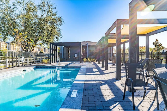 view of swimming pool with a patio area and a gazebo