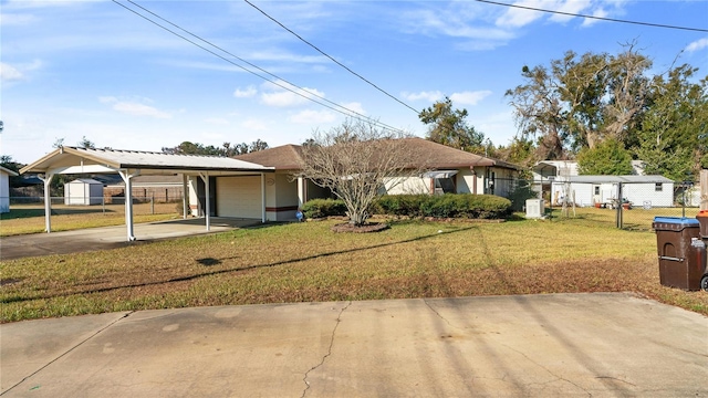 view of front of house featuring a front lawn, a garage, and a carport