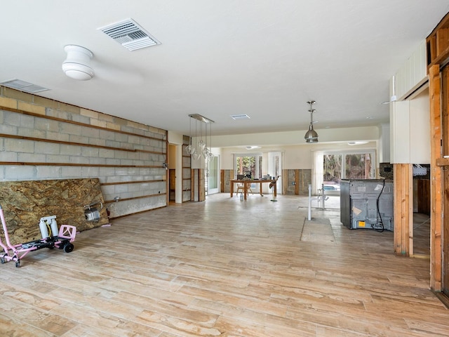 basement featuring light hardwood / wood-style flooring