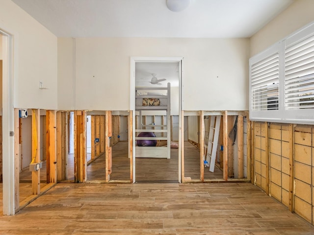 miscellaneous room featuring wood-type flooring