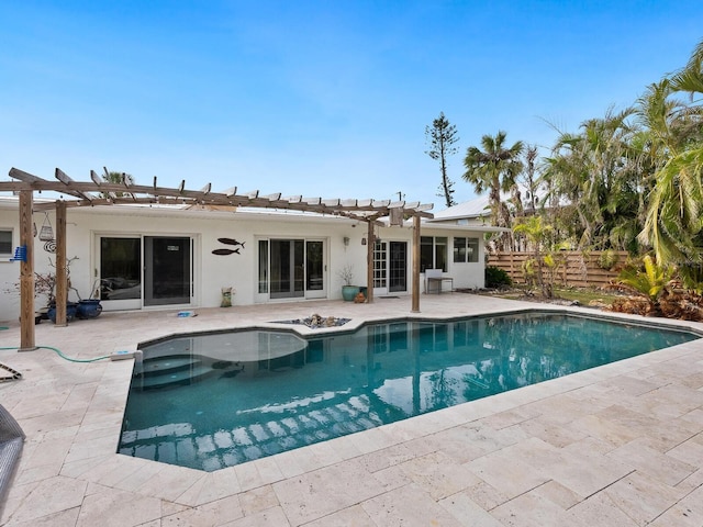 view of pool with a pergola and a patio area