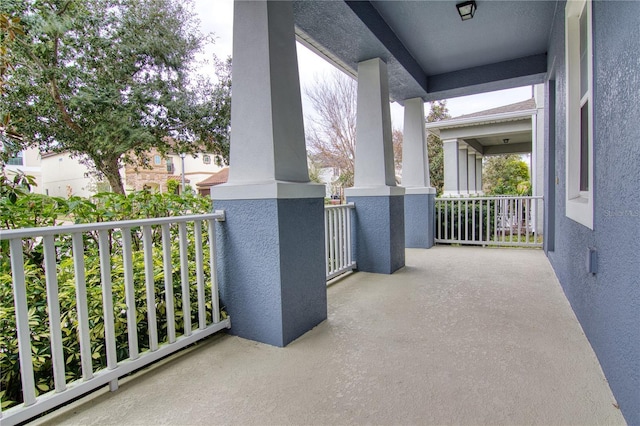 balcony featuring a porch