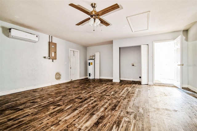 interior space featuring electric water heater, electric panel, hardwood / wood-style floors, ceiling fan, and a wall mounted air conditioner