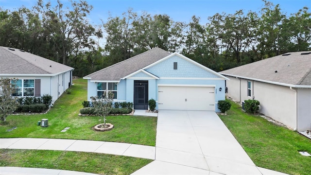 view of front facade featuring a garage and a front yard