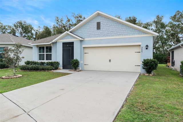 3627 Crimson Clover Dr, Mount Dora, FL 32757 - ranch-style home featuring stucco siding, a front lawn, concrete driveway, and a garage