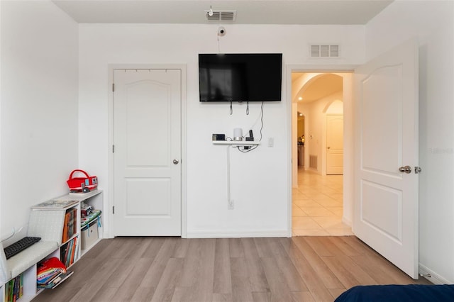 unfurnished bedroom featuring light hardwood / wood-style floors