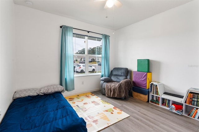 3627 Crimson Clover Dr, Mount Dora, FL 32757 - bedroom featuring baseboards, a ceiling fan, and wood finished floors