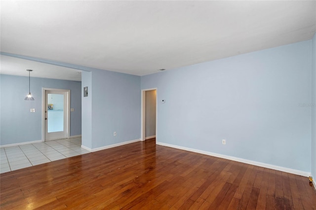 unfurnished room featuring light hardwood / wood-style flooring