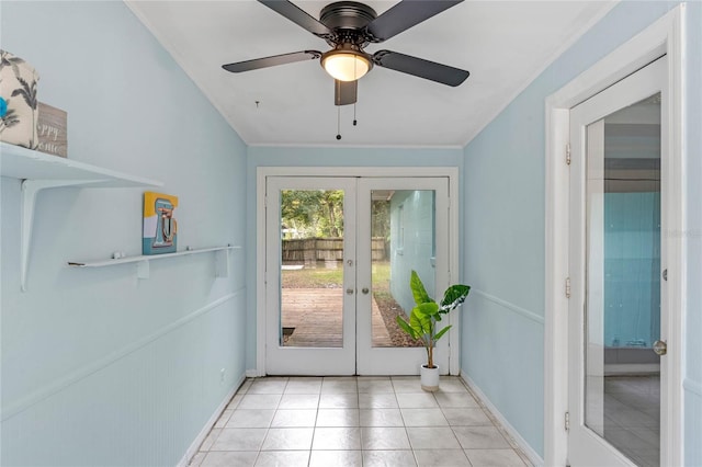 doorway to outside with ceiling fan, french doors, and light tile patterned flooring