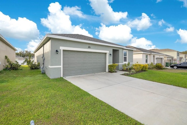 view of front of home featuring a front lawn and a garage