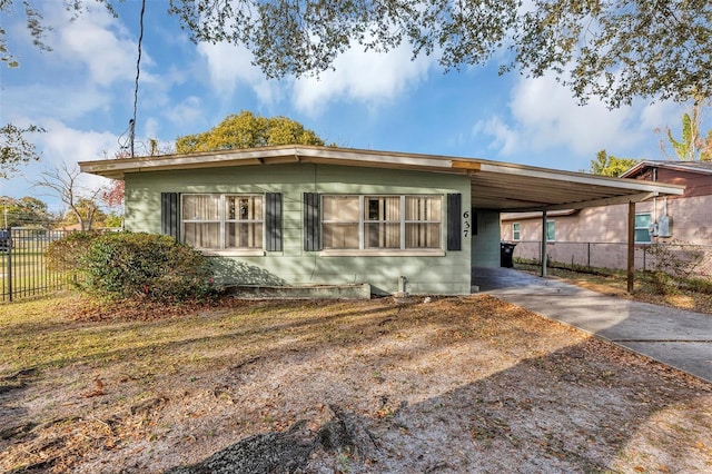 exterior space featuring a carport