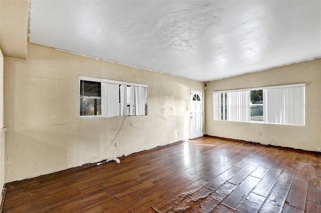 empty room featuring hardwood / wood-style floors