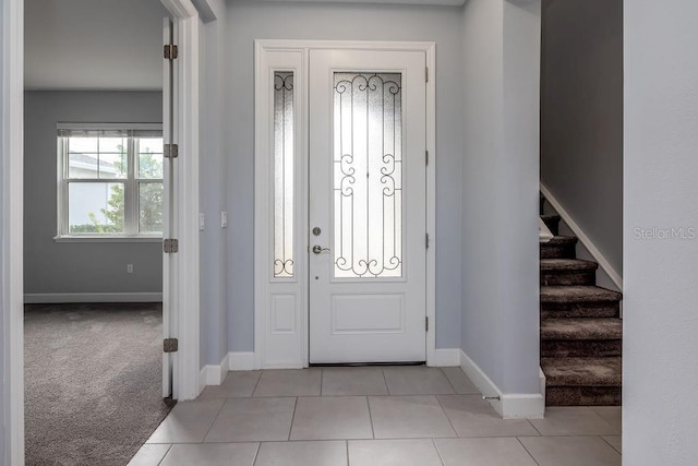 view of tiled foyer entrance