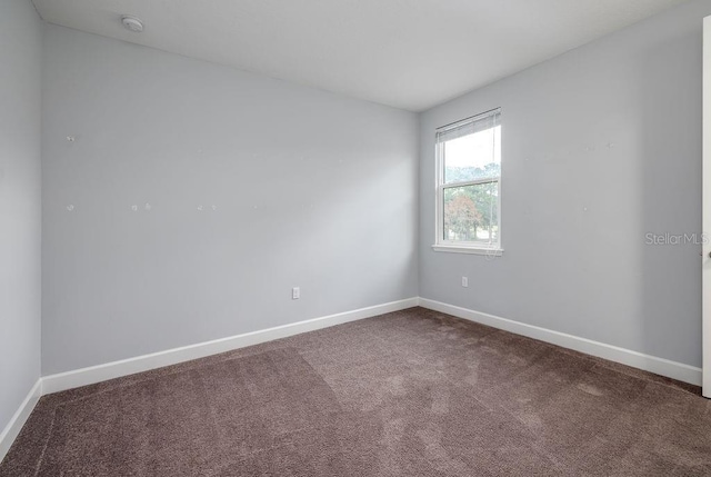 empty room with carpet flooring