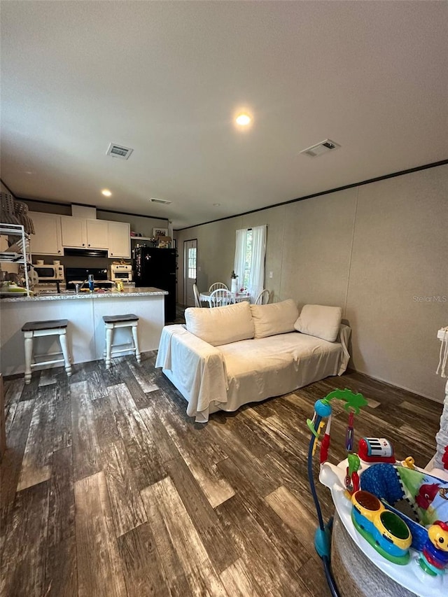 living room with dark wood-type flooring