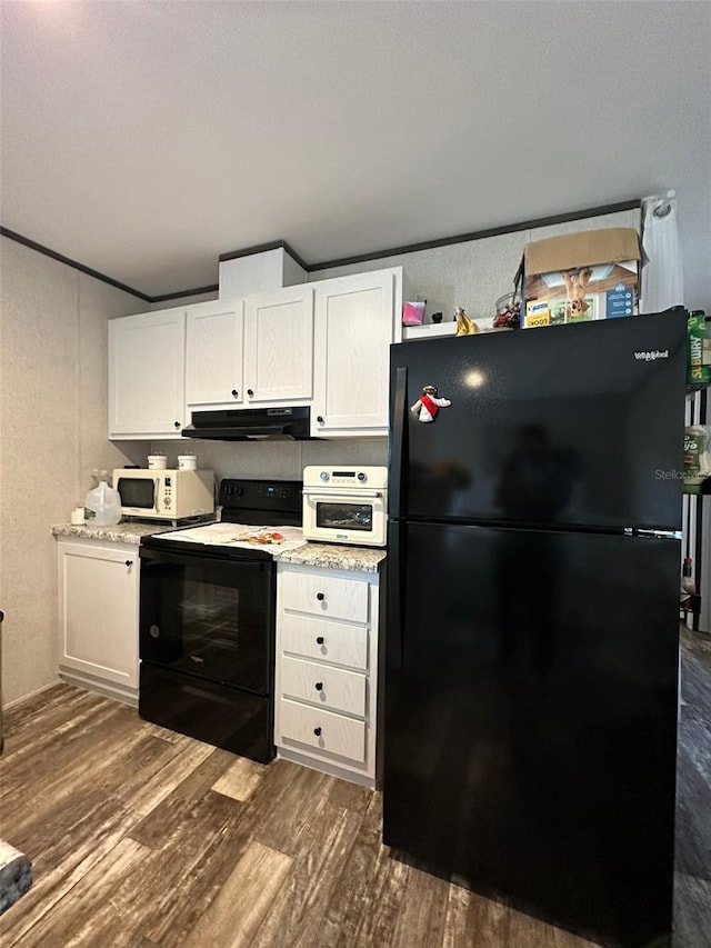 kitchen featuring black appliances, white cabinets, dark wood-type flooring, and crown molding