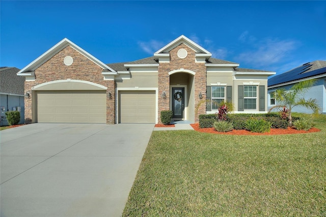 view of front facade featuring a front yard and a garage