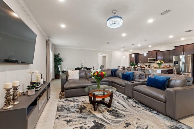 living area featuring ornamental molding, recessed lighting, visible vents, and light tile patterned flooring